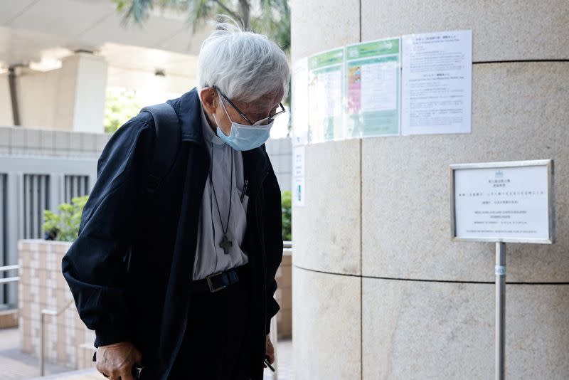 Retired bishop Cardinal Joseph Zen Ze-kiun arrives at the West Kowloon Magistrates' courts for allegedly failing to register the legal and medical fund that helped those embroiled in the 2019 anti-government protests as a society, in Hong Kong