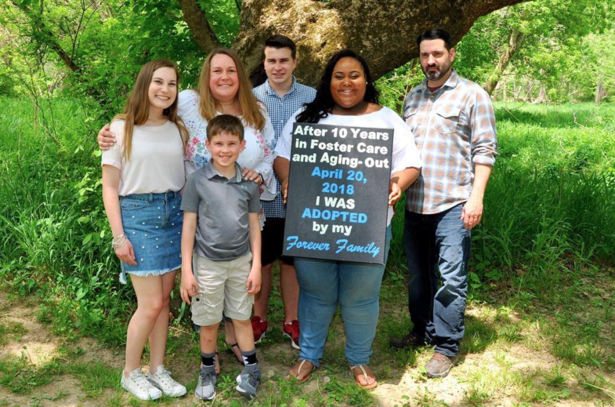 Shay Roberson with her forever family; she was adopted at 24 by her former school resource officer. (Photo: Shay Roberson via Facebook)