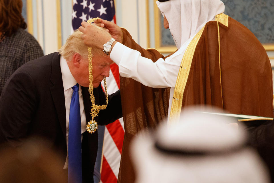 <p>Saudi King Salman presents President Donald Trump with The Collar of Abdulaziz Al Saud Medal at the Royal Court Palace, Saturday, May 20, 2017, in Riyadh. (Photo: Evan Vucci/AP) </p>