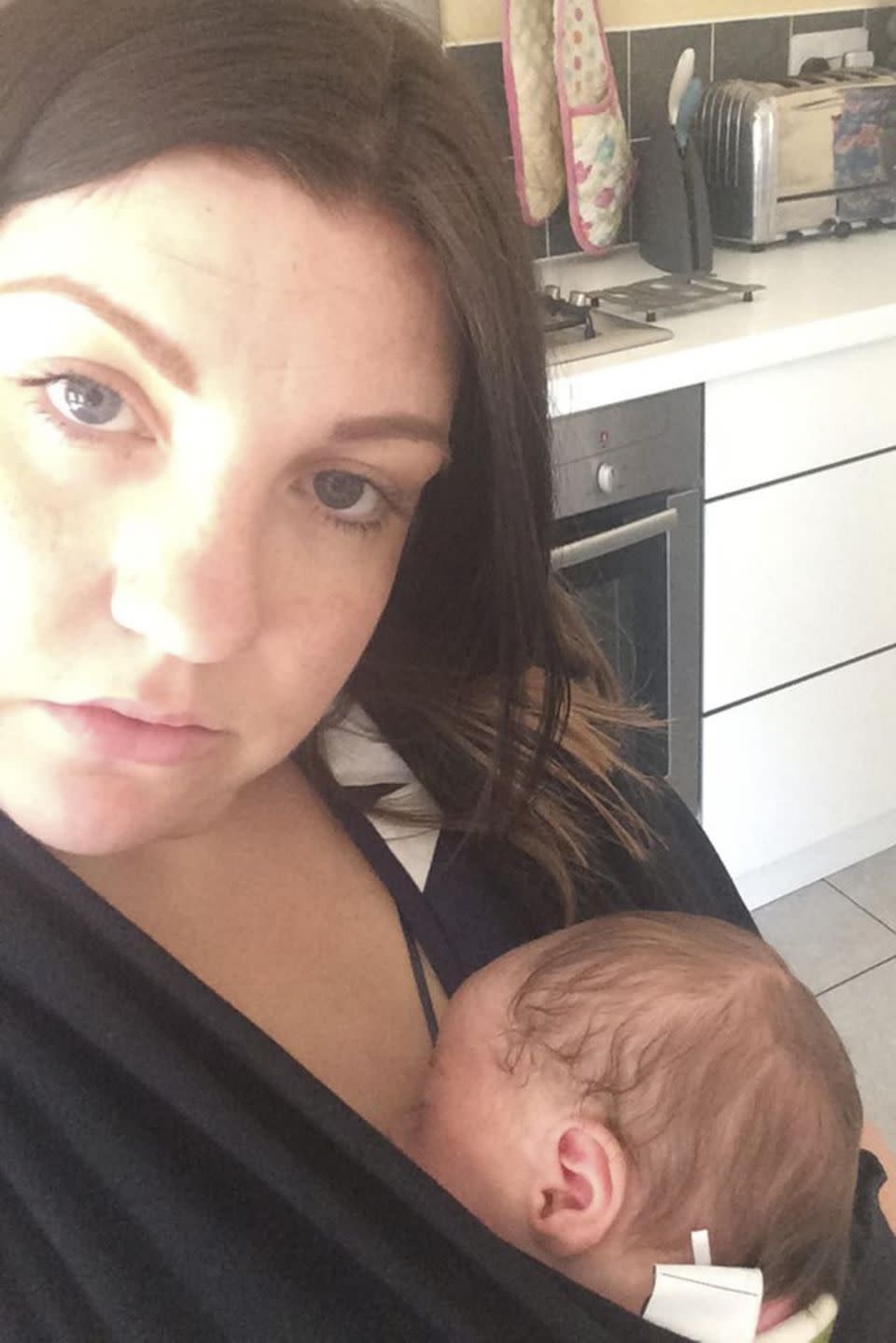 Danielle's breast size made it difficult to feed her son Jack. Photo: Caters News