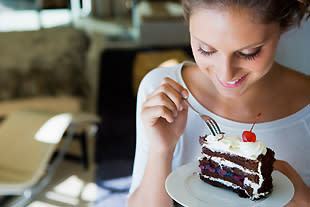 woman eating cake