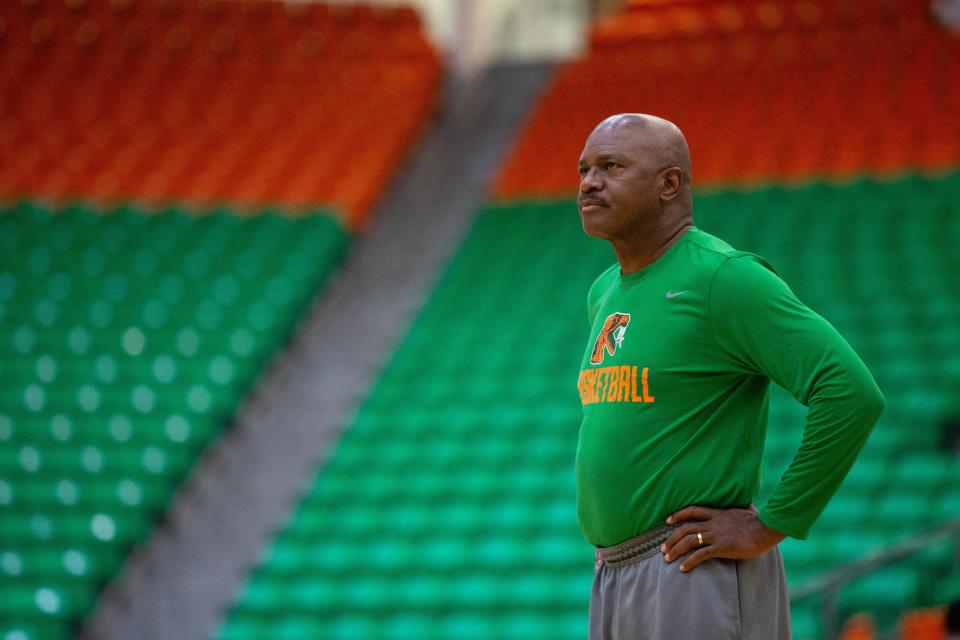 Florida A&M men's basketball head coach Robert McCullum leads the team during a practice at the Al Lawson Center.