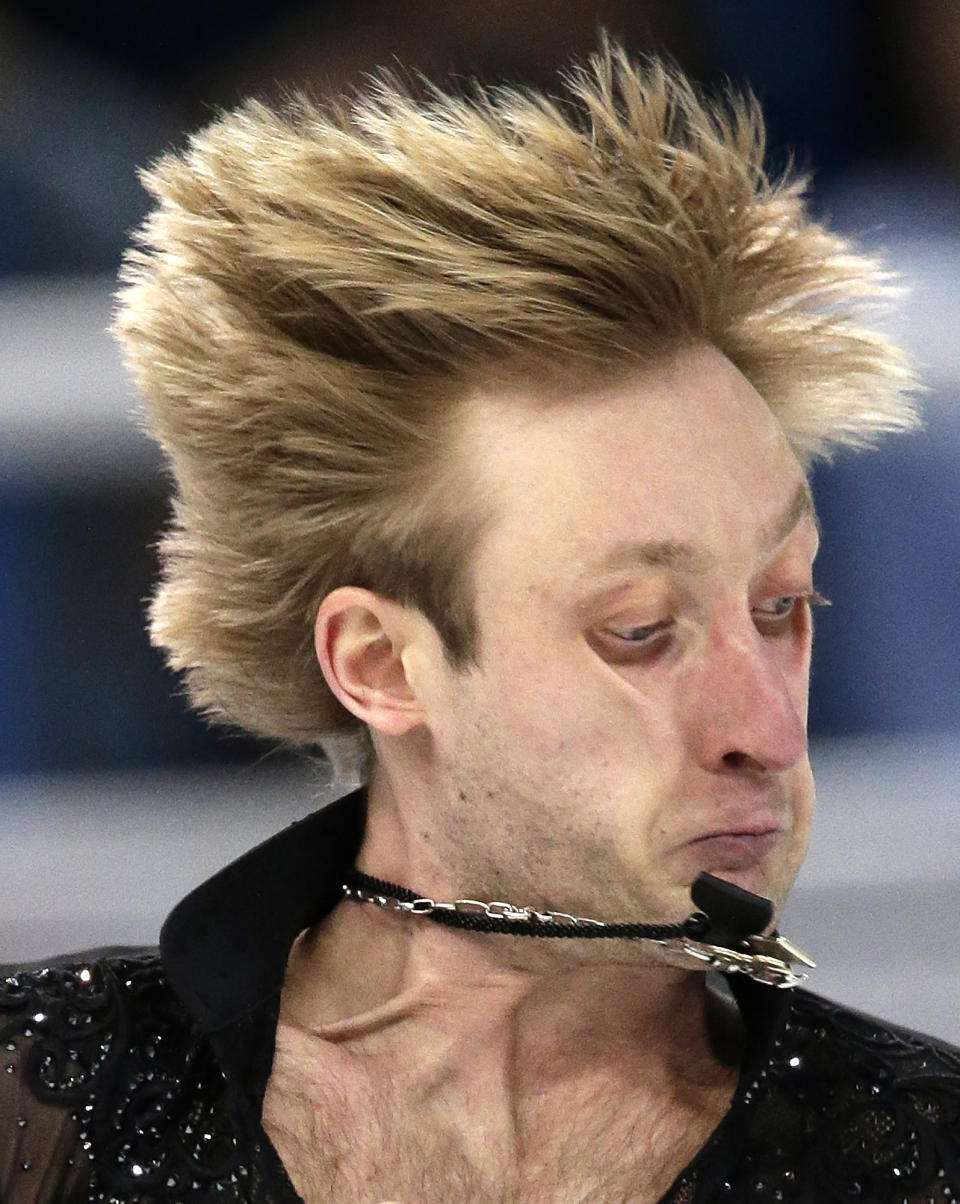 Evgeni Plushenko of Russia competes in the men's team free skate figure skating competition at the Iceberg Skating Palace during the 2014 Winter Olympics, Sunday, Feb. 9, 2014, in Sochi, Russia. (AP Photo/Bernat Armangue)