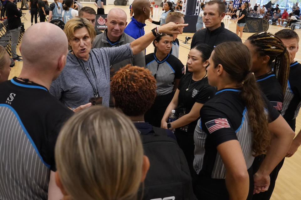 Wanda Szeremeta, second from left, gives instruction to NCAA referees at the NCAA College Basketball Academy, Friday, July 28, 2023, in Memphis, Tenn. (AP Photo/George Walker IV)