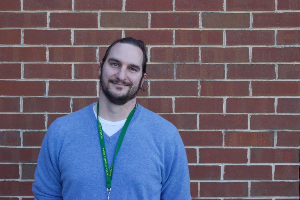 Paul Webster, EastSide Charter School humanities teacher, is pictured at The Warehouse in Wilmington on Monday, November 8, 2021.