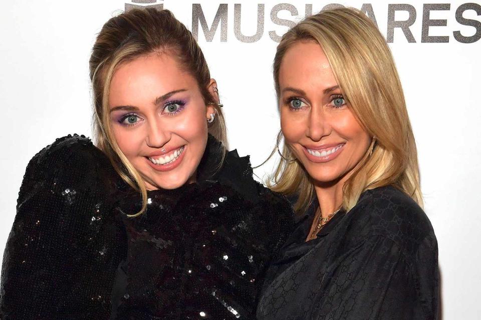 <p>Lester Cohen/Getty Images</p> Miley Cyrus (L) and Tish Cyrus attend MusiCares Person of the Year honoring Dolly Parton at Los Angeles Convention Center on February 8, 2019 in Los Angeles