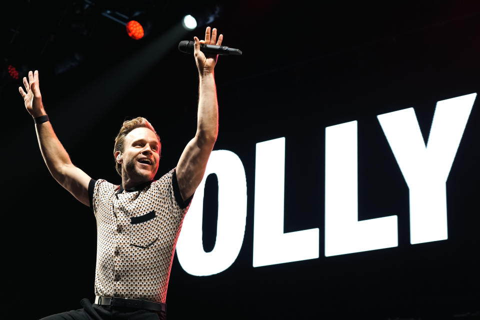 MANCHESTER, ENGLAND - NOVEMBER 11: Olly Murs performs on stage during HITS Radio Live Manchester at AO Arena on November 11, 2022 in Manchester, England. (Photo by Dominic Lipinski/Getty Images for Bauer)