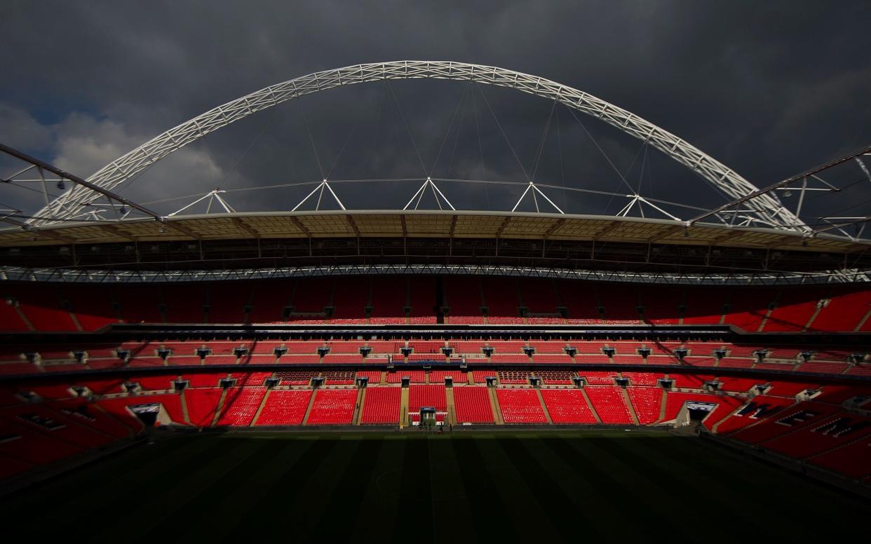 Wembley arch - Eddie Mulholland/Telegraph