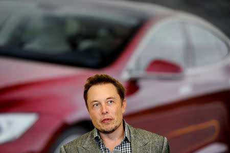 FILE PHOTO: Tesla Chief Executive Office Elon Musk speaks at his company's factory in Fremont, California, U.S., June 22, 2012. REUTERS/Noah Berger/File Photo