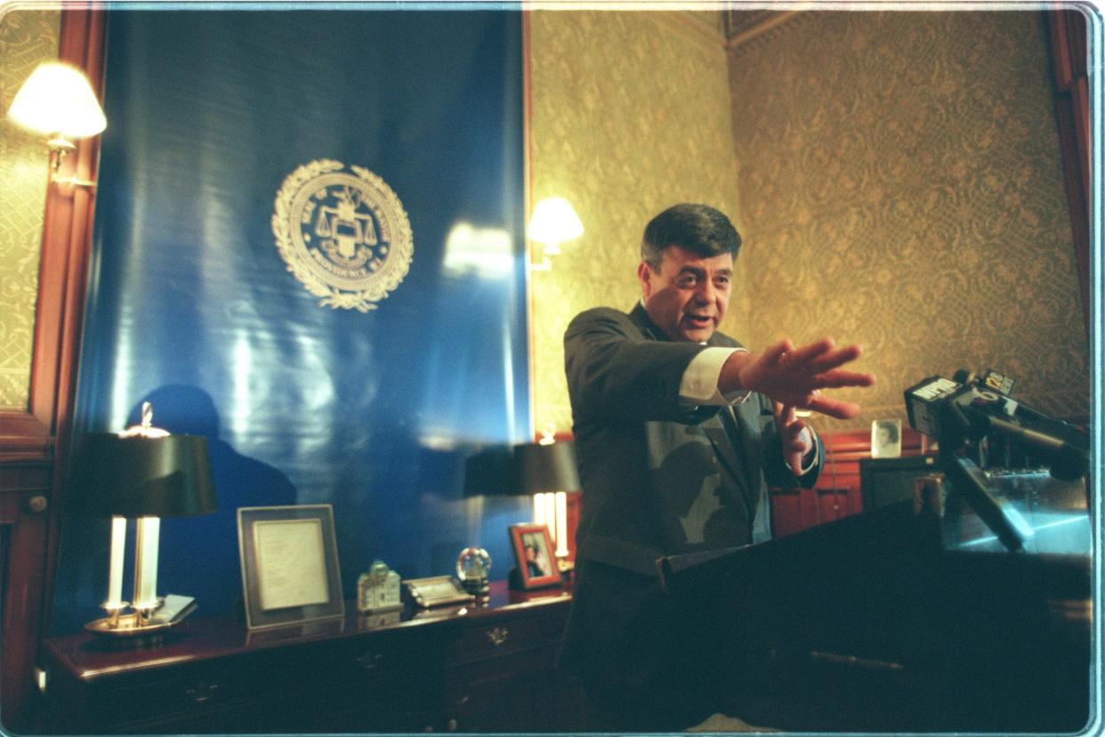 A Providence Journal file photo shows Providence Mayor Vincent A. Cianci Jr. strongly denying any involvement in the Operation Plunder Dome scandal when questioned about the investigation during a press conference on teacher contract negotiations.