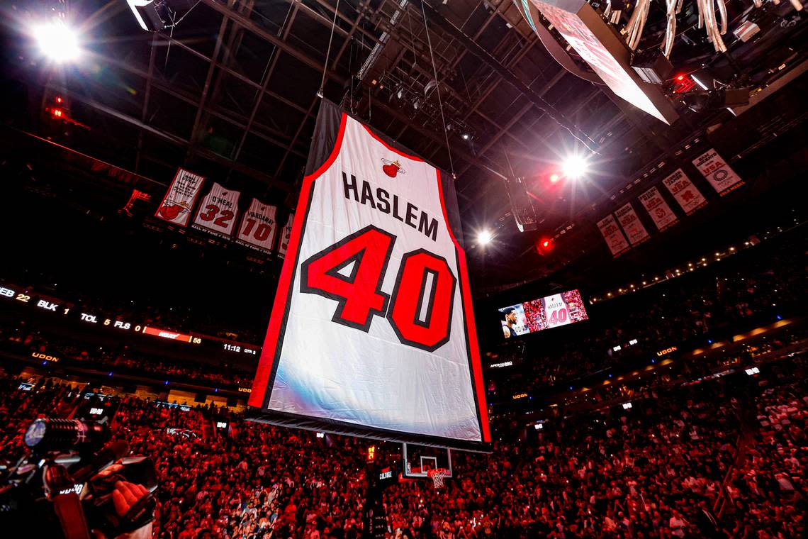 Miami Heat’s Udonis Haslem’s retired jersey number rises on display during the halftime ceremony in the game between the Miami Heat and the Atlanta Hawks at the Kaseya Center in Miami, Florida on Friday, January 19, 2024. 