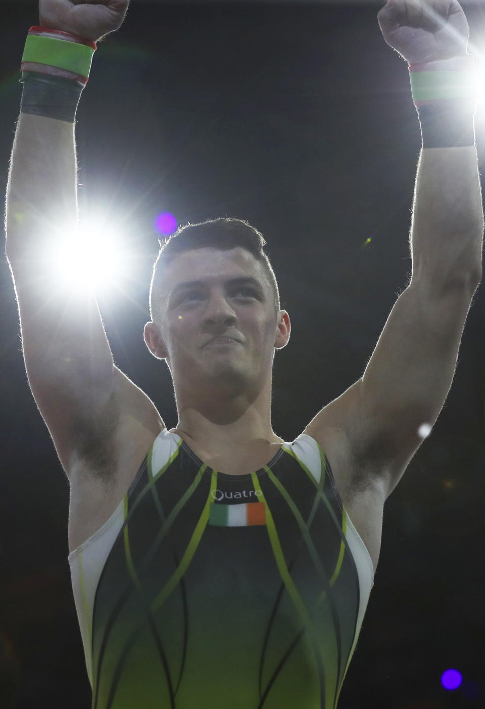 Bronze medalist Rhys McClenaghan of Ireland celebrates after his performance on the pommel horse in the men's apparatus finals at the Gymnastics World Championships in Stuttgart, Germany, Saturday, Oct. 12, 2019. (AP Photo/Matthias Schrader)