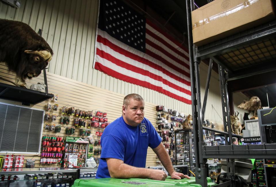 “When you see it being taken away, you’ve got to stand up, said John Cartwright. “It’s the same as defending your life.” Cartwright, who founded Kentucky United — a pro-Second Amendment group,  cannot legally possess a gun because of a past felony conviction. In 2012, he pleaded guilty to multiple counts of defrauding a secured creditor, court records show. “I can’t own a gun … but it doesn’t mean I don’t believe in something,” the 51-year-old said. “I can fight for other people’s freedoms whether I have them or not.” He was visiting the Kentucky Gun Co. in Bardstown.