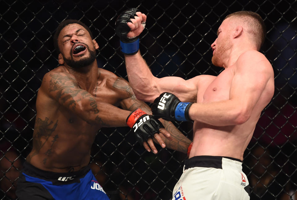 Justin Gaethje (R) lands a right uppercut on Michael Johnson during their bout on July 7, 2017. It is one of two bouts involving Gaethje that became finalists for the 2017 Yahoo Sports MMA Fight of the Year award. (Getty Images)