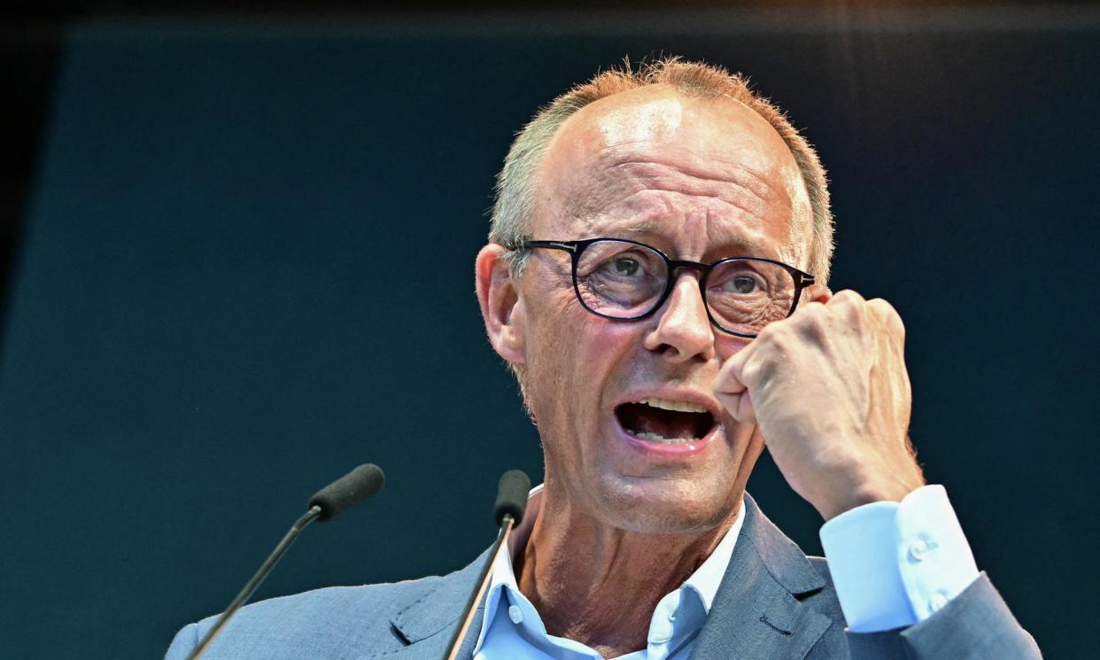 <span>Friedrich Merz addresses the audience during a campaign event for Brandenburg's regional state elections on 4 September.</span><span>Photograph: Tobias Schwarz/AFP/Getty Images</span>