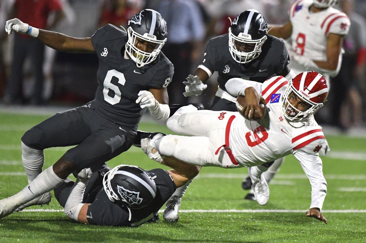 Mater Dei quarterback Bryce Young (9) is the No. 2 quarterback recruit out of California in 2020, and he flipped his commitment from USC to Alabama last month. (Scott Varley/The Orange County Register via AP)