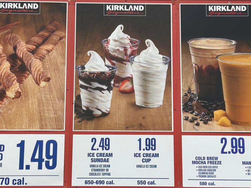 Costco's Kirkland menu sign in food court showing soft-serve in cups with 2.49 and 1.99 prices