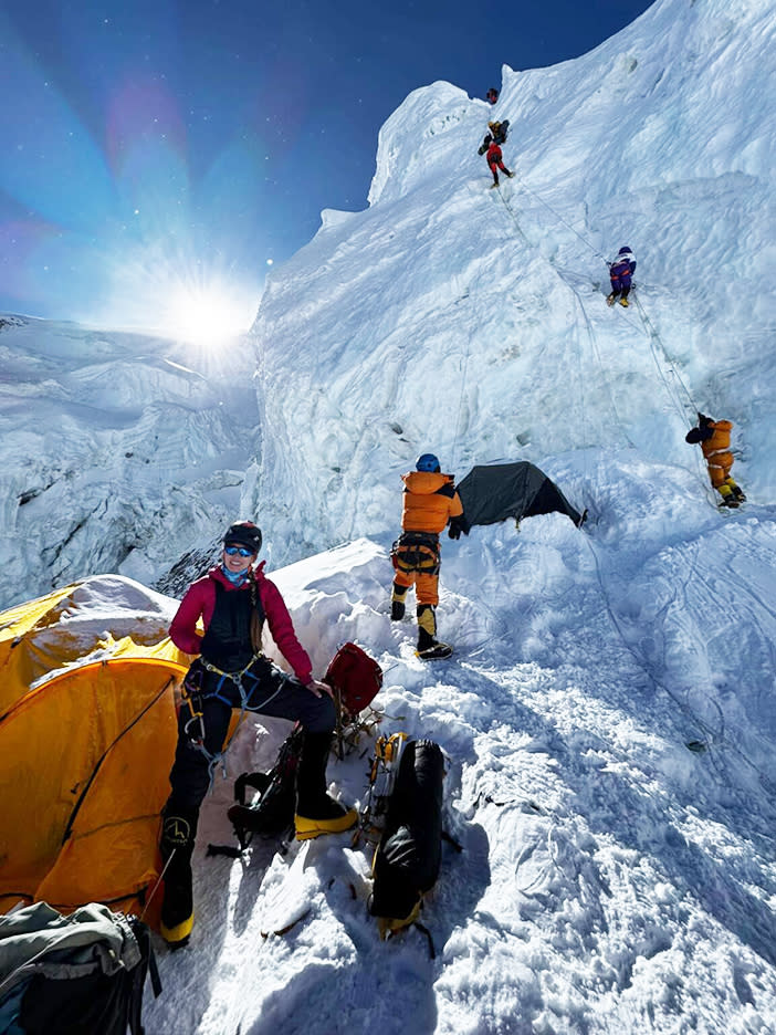 climbers on a vertical serac.