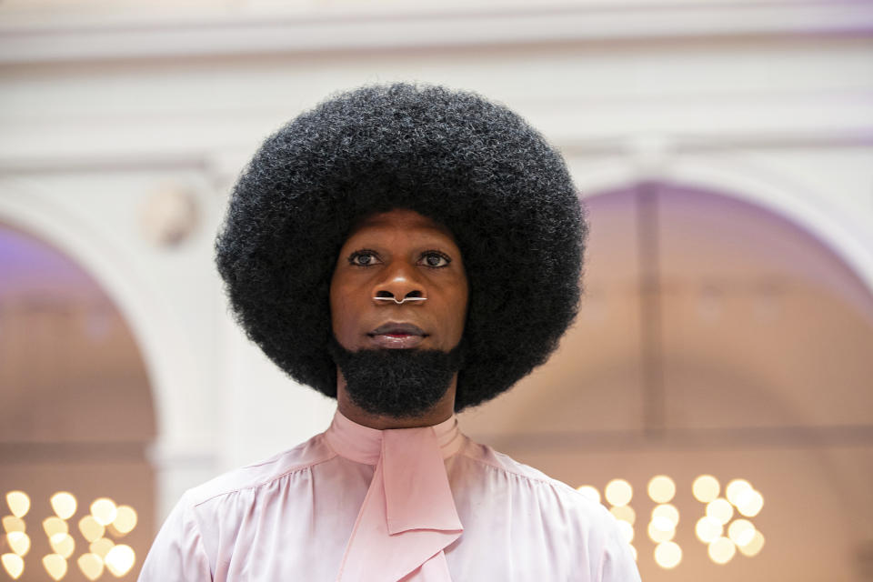 A model walks during a rehearsal at the dapperQ fashion show at the Brooklyn Museum on Thursday, Sept. 5, 2019, in New York. (AP Photo/Jeenah Moon)