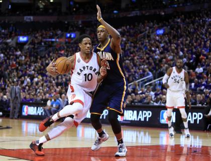 TORONTO, ON - APRIL 18:  DeMar DeRozan #10 of the Toronto Raptors drives to the basket as Myles Turner #33 of the Indiana Pacers defends in the second half of Game Two of the Eastern Conference Quarterfinals during the 2016 NBA Playoffs at the Air Canada Centre on April 18, 2016 in Toronto, Ontario, Canada.  NOTE TO USER: User expressly acknowledges and agrees that, by downloading and or using this photograph, User is consenting to the terms and conditions of the Getty Images License Agreement.  (Photo by Vaughn Ridley/Getty Images)