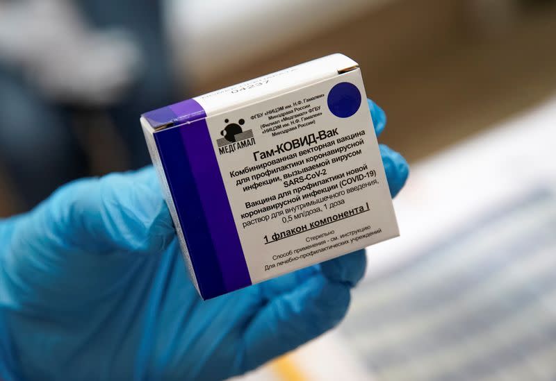 A nurse shows a box with Russia's "Sputnik-V" vaccine against the coronavirus disease (COVID-19) prepared for inoculation in a post-registration trials stage at a clinic in Moscow