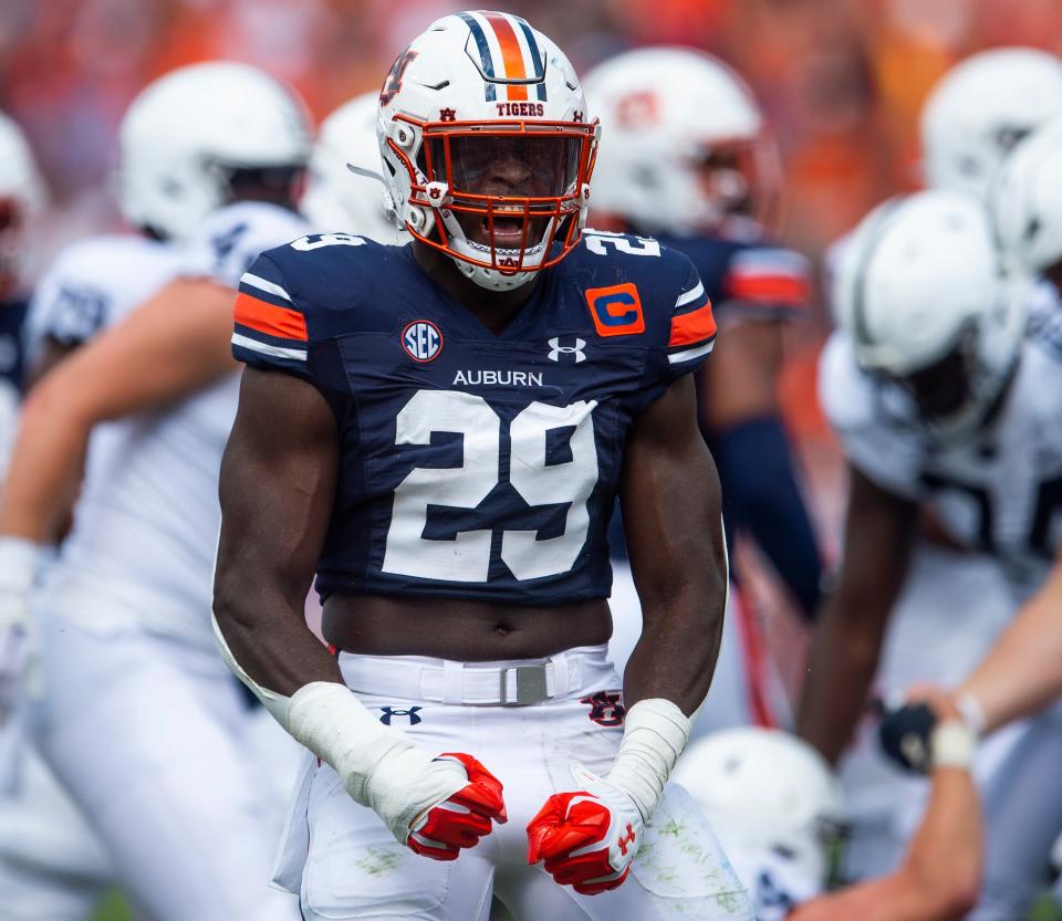 Auburn Tigers defensive lineman Derick Hall (29) celebrates as the Auburn Tigers take on the Penn State Nittany Lions at Jordan-Hare Stadium in Auburn, Ala., on Saturday, Sept. 17, 2022.