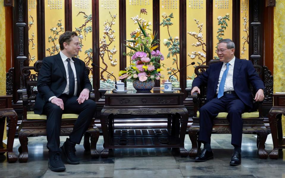 The Tesla boss met Chinese Premier Li Qiang during a surprise visit to China on Monday
