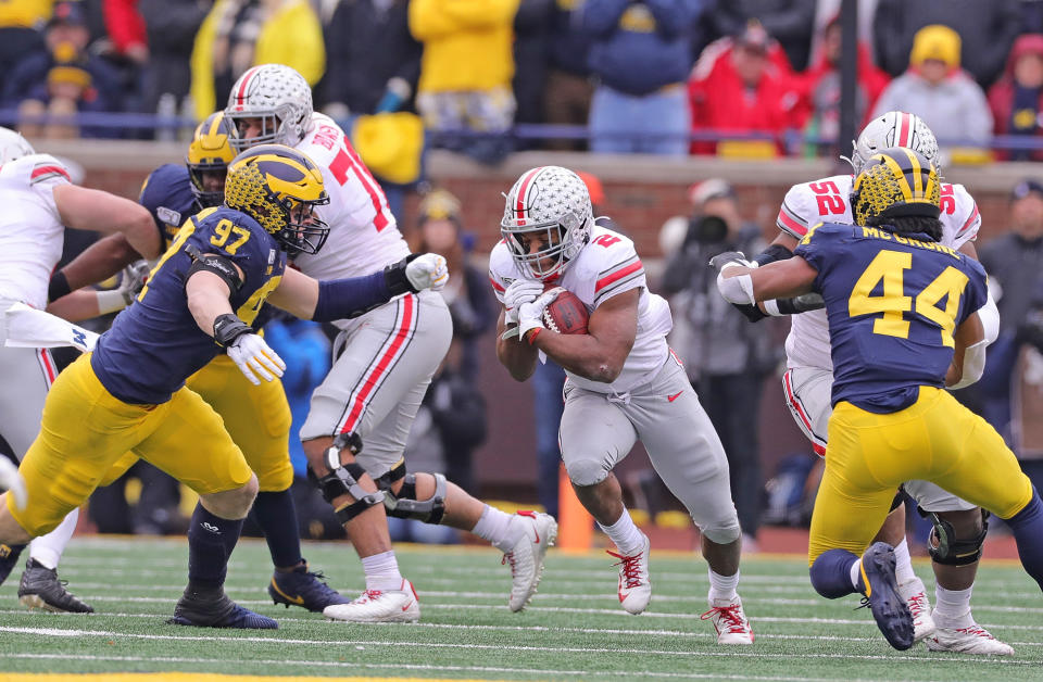 Ohio State RB J.K. Dobbins rushed for 211 yards and four scores against Michigan. (Photo by Leon Halip/Getty Images)