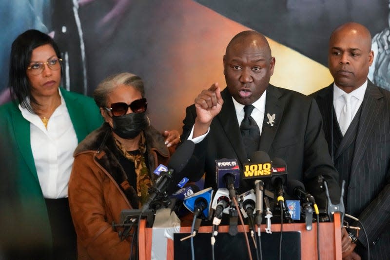 Attorney Ben Crump, speaks during a news conference, Feb. 21, 2023, at the Malcolm X & Dr. Betty Shabazz Memorial and Educational Center in New York, accompanied by the daughters of Malcom X, Ilyasah Shabazz, left, and Qubilah Shabbaz, second from left, and attorney Ray Hamlin, right.