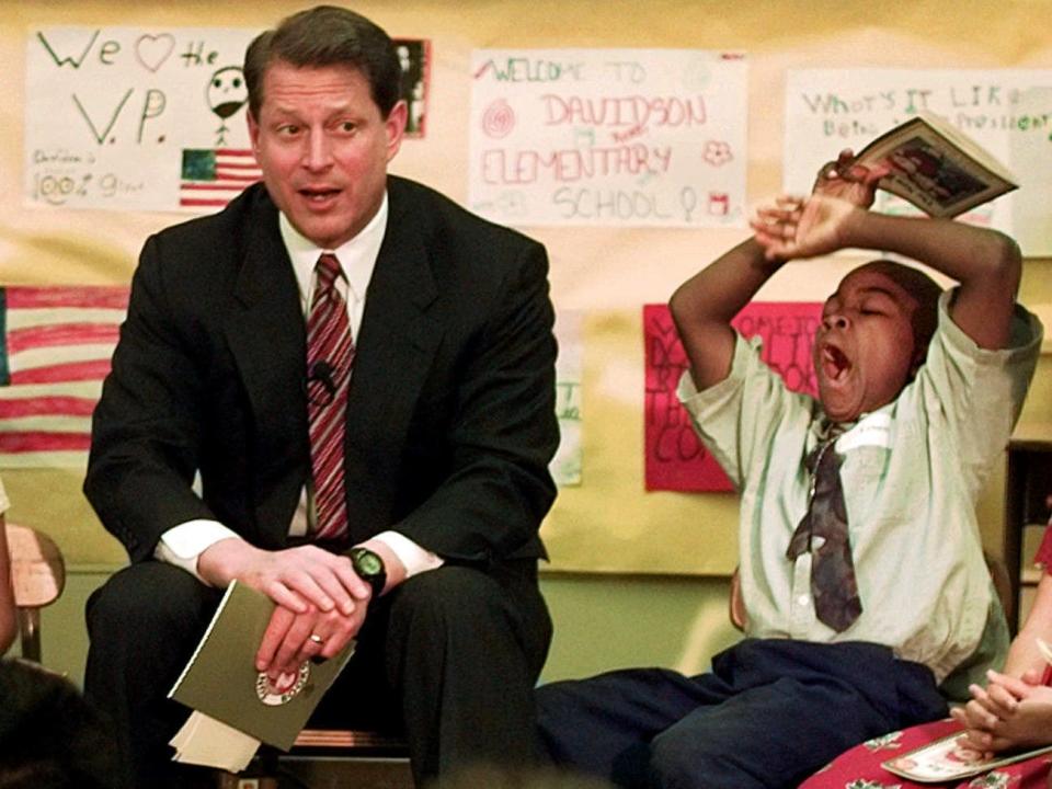 Vice President Al Gore talks to a group of elementary students in 1997