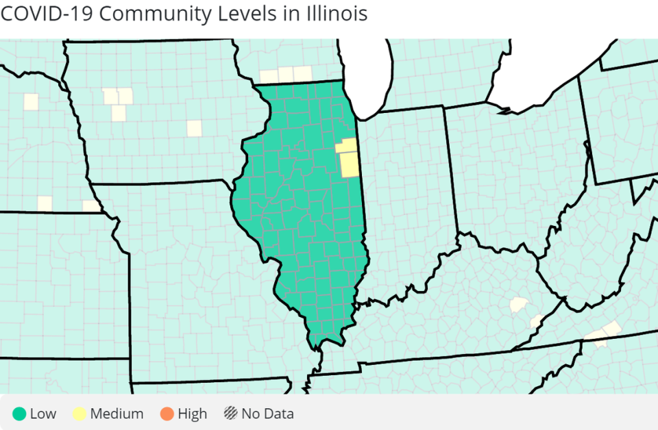 The U.S. Centers for Disease Control and Prevention rated two Illinois counties at medium COVID-19 levels, seen here in yellow, as of April 20, 2023.