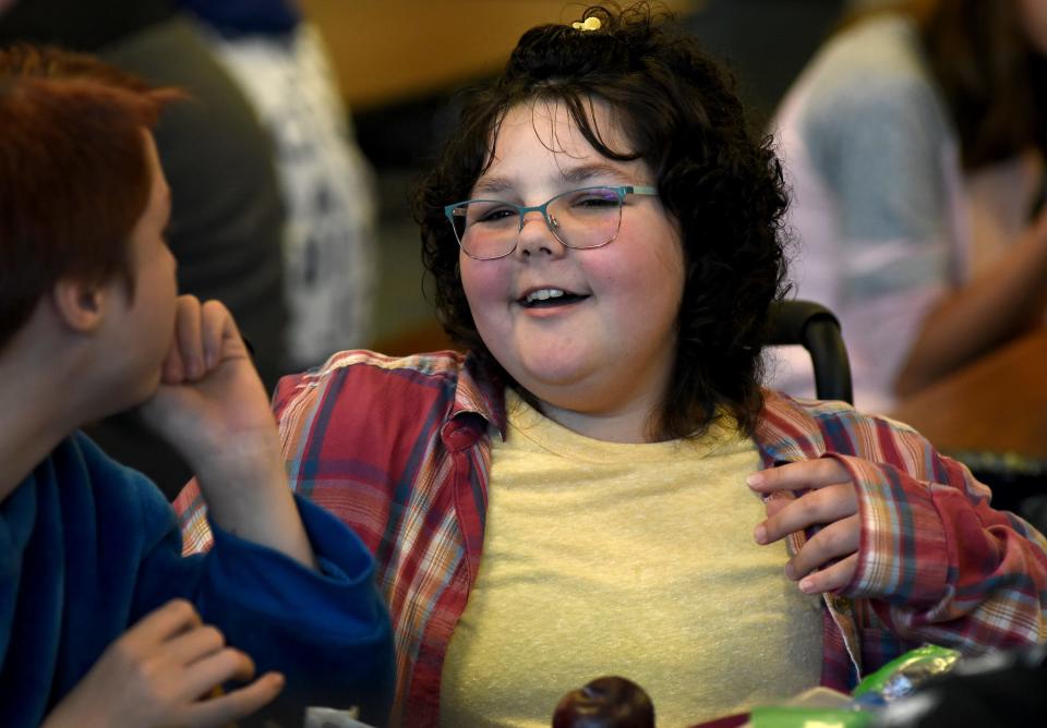 Elly Wickenheiser enjoys lunch with her friends.