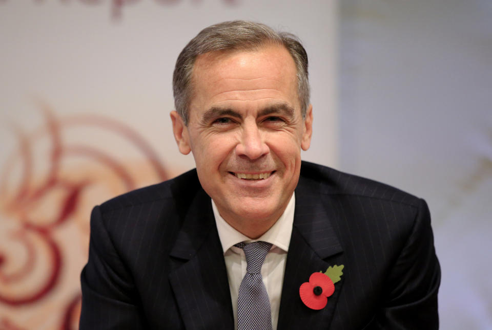 Governor of the Bank of England Mark Carney attends an Inflation Report press conference, at the Bank of England, in London, Thursday Nov. 5, 2015. The Bank of England refrained Thursday from raising its interest rate from a record low of 0.5 percent as weak inflation make the timing of a first increase ever more uncertain _ signaling it could even stretch to 2017. (Jonathan Brady/Pool Photo via AP)