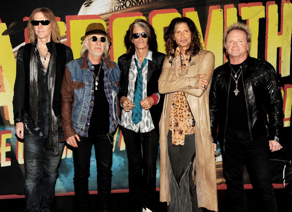 WEST HOLLYWOOD, CA - SEPTEMBER 18:  (L-R) Musicians Tom Hamilton, Brad Whitford, Joe Perry, Steven Tyler and Joey Kramer of Aerosmith pose at the press junket to announce their new album 