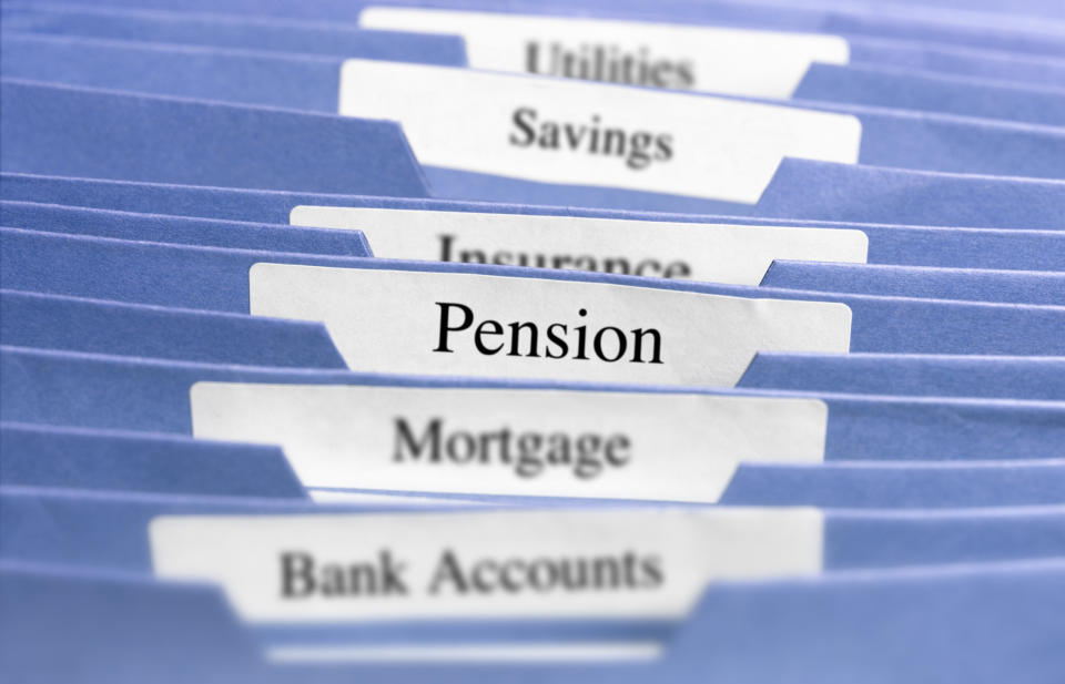 Files with "Mortgage" and "Pension" labels on them