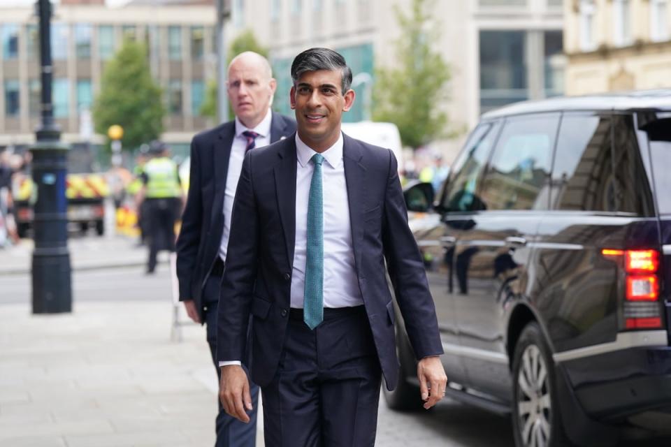 Prime Minister Rishi Sunak (C) arrives for a Sky News election event on June 12, 2024 in Grimsby (Getty Images)