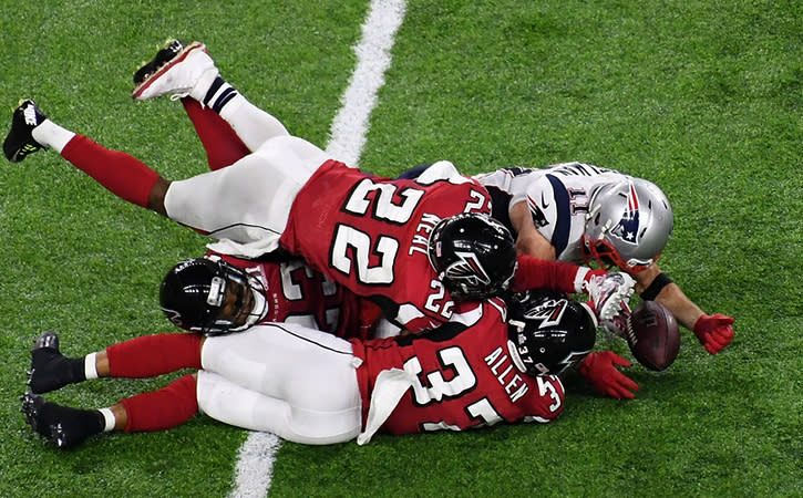 Feb 5, 2017; Houston, TX, USA; New England Patriots wide receiver Julian Edelman (11) catches a tipped pass just off the turf against the Atlanta Falcons in the fourth quarter during Super Bowl LI at NRG Stadium. Mandatory Credit: Richard Mackson-USA