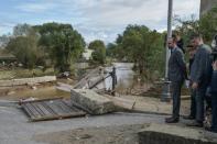 French Prime Minister Edouard Philippe visited the scene, saying the government would press insurers to process disaster claims rapidly