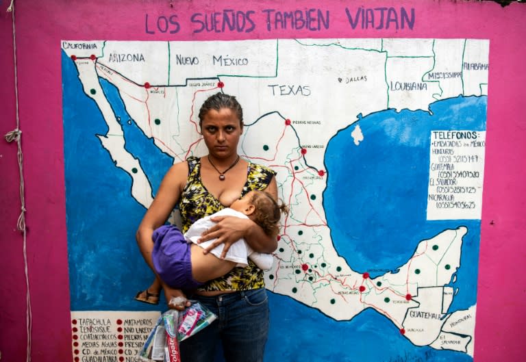 A Guatemalan migrant woman, Paola, nurses her baby at the Las Patronas shelter