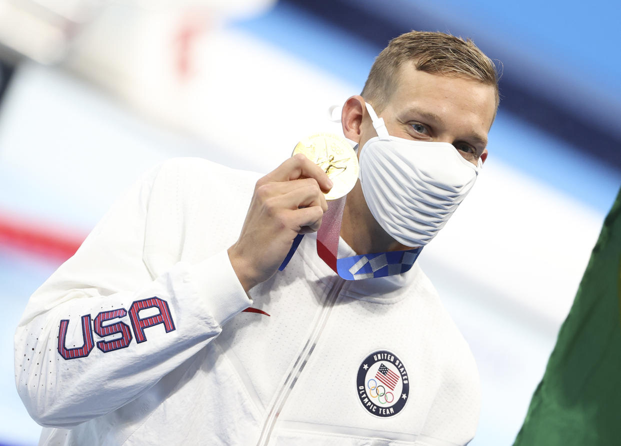 Caeleb Dressel with one of the five golds he won in Tokyo for Team USA. (Getty)