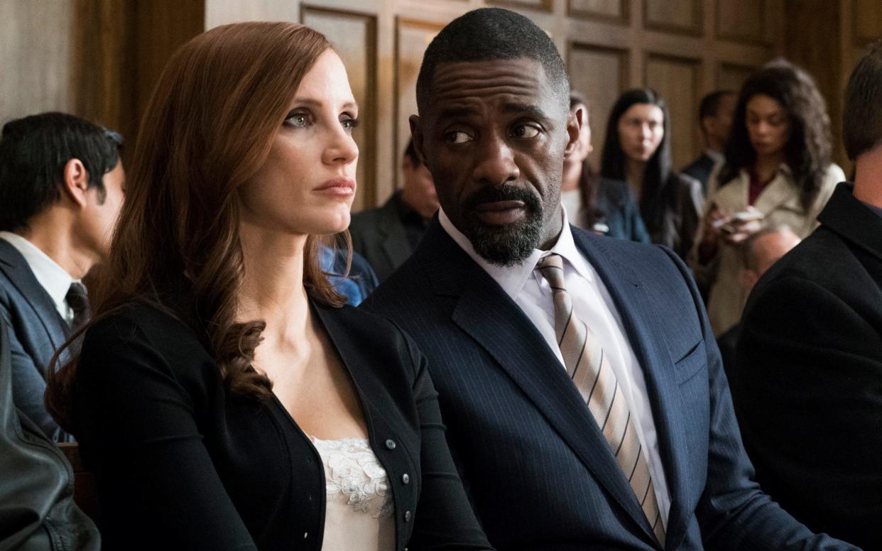 Jessica Chastain and Idris Elba as Molly Bloom and her lawyer Charlie Jaffey - Motion Picture Artwork © 2017 STX Financing, LLC. All Rights Reserved.