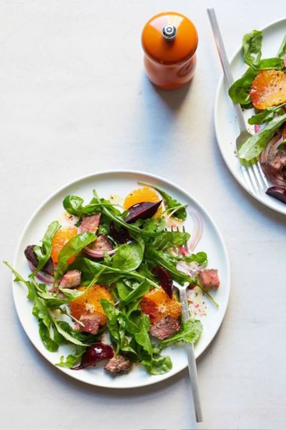 <p>You don't have to cut red meat from your diet: Portions and leaner cuts are key. Pairing steak with oranges and beets helps keep this salad light and refreshing, yet totally satisfying.</p><p><a href="https://www.womansday.com/food-recipes/food-drinks/recipes/a53273/beet-tangerine-and-steak-salad/" rel="nofollow noopener" target="_blank" data-ylk="slk:Get the recipe for Beet, Tangerine and Steak Salad." class="link "><em>Get the recipe for Beet, Tangerine and Steak Salad.</em></a><br></p>