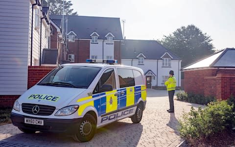 Police outside the home of Charlie Rowley, 45, in Muggleton Road in Amesbury, Wiltshire, where a bottle containing Novichok was found - Credit: Steve Parsons/PA