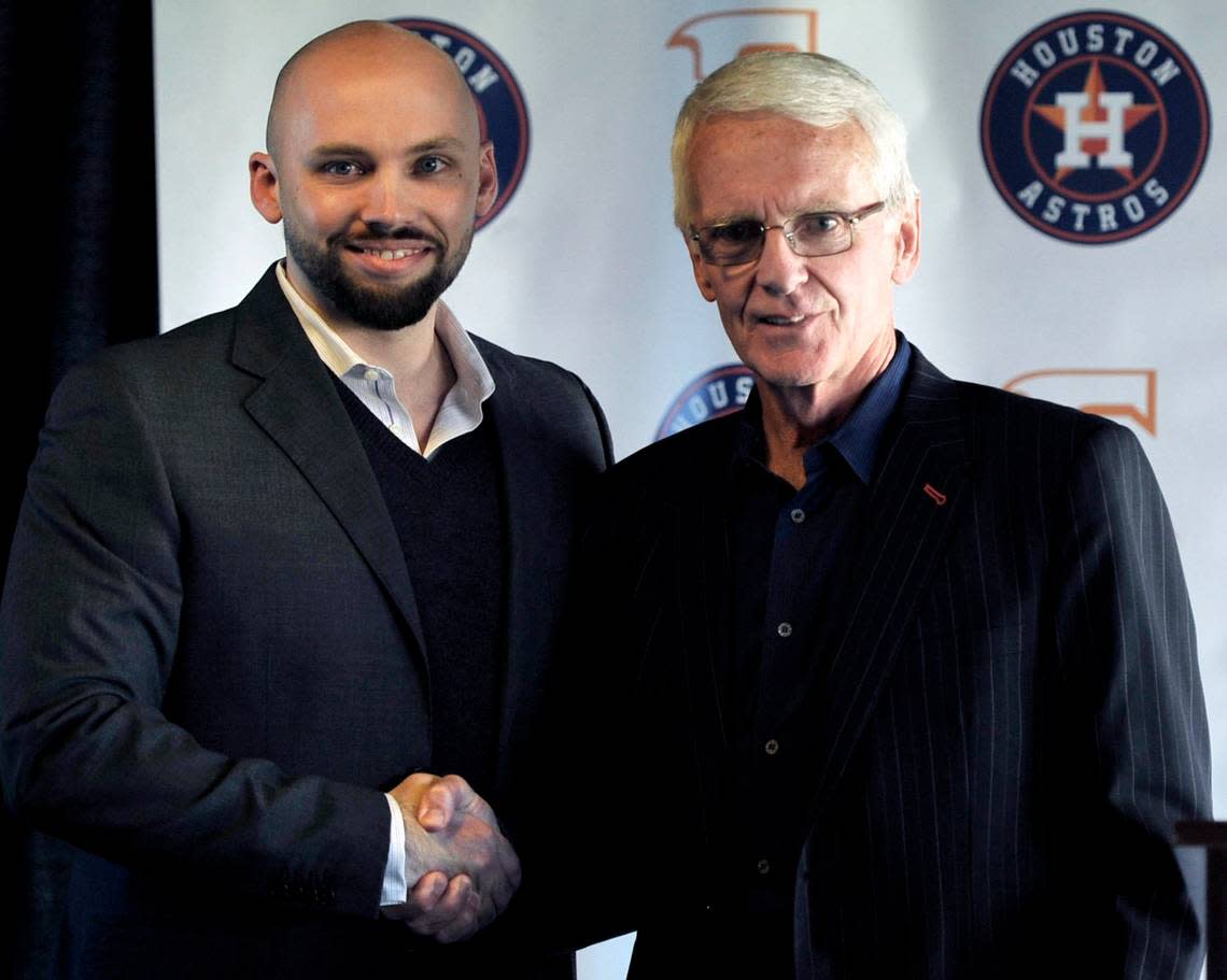 Derek Franks, left, poses with a photograph with team president Chris Cummings, right, after Cummings announced Franks as the new general manager for the Fresno Grizzlies at a press conference March 5, 2015 held at Chukchansi Park in Fresno, Calif.