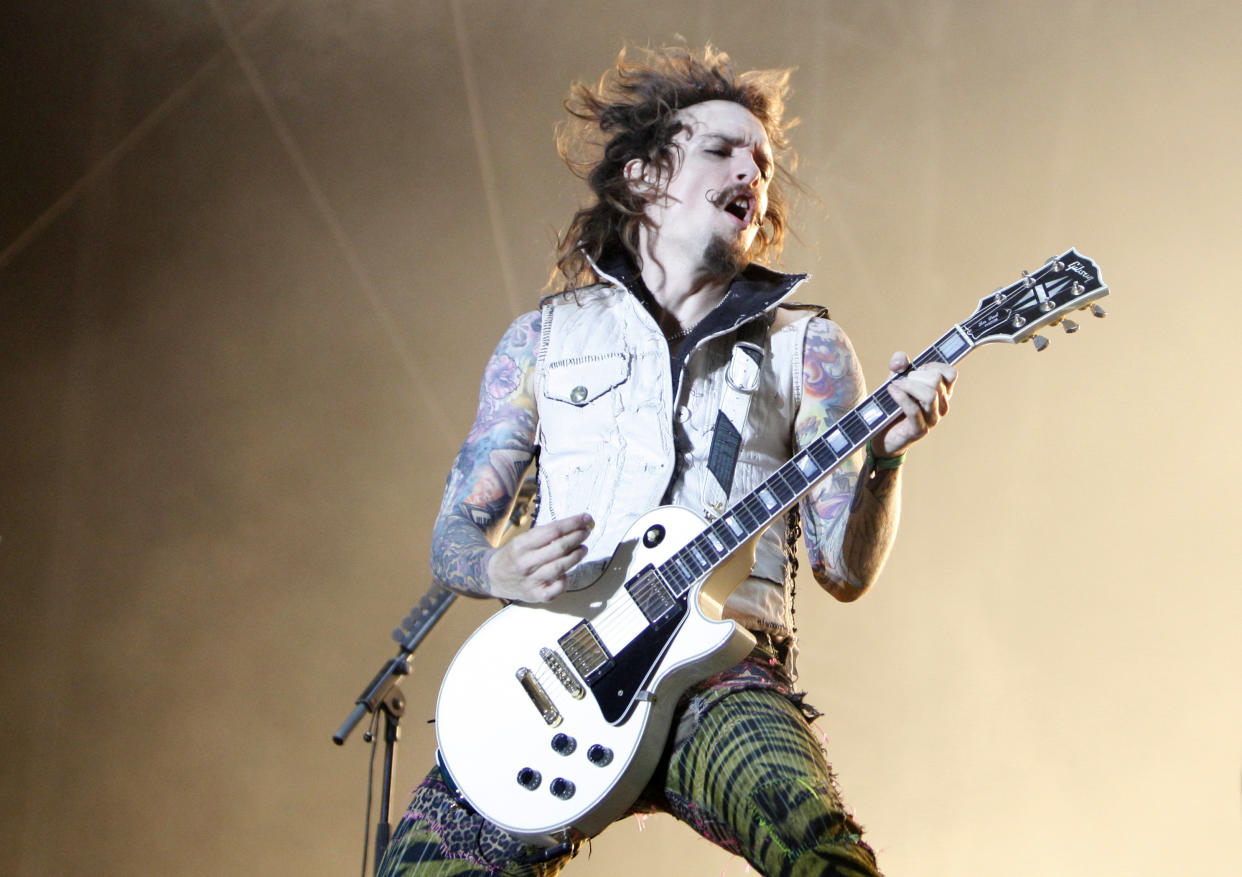 Musician Justin Hawkins of the British band The Darkness performs on stage at the Nova Rock music festival in Nickelsdorf, some 70 kilometres (44 miles) east of Vienna, June 11, 2011. Nova Rock is Austria's largest rock festival which takes place from June 11 to June 13, 2011.  REUTERS/Lisi Niesner  (AUSTRIA - Tags: ENTERTAINMENT)