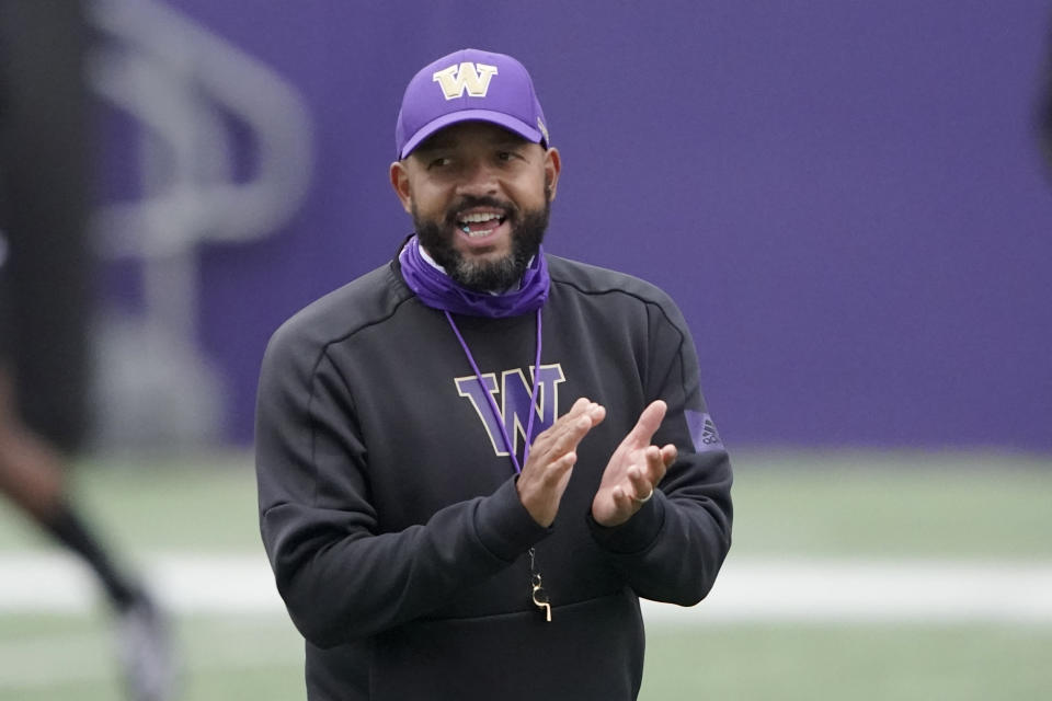 Washington head coach Jimmy Lake calls to his team during NCAA college football practice, Friday, Oct. 16, 2020, in Seattle. (AP Photo/Ted S. Warren)