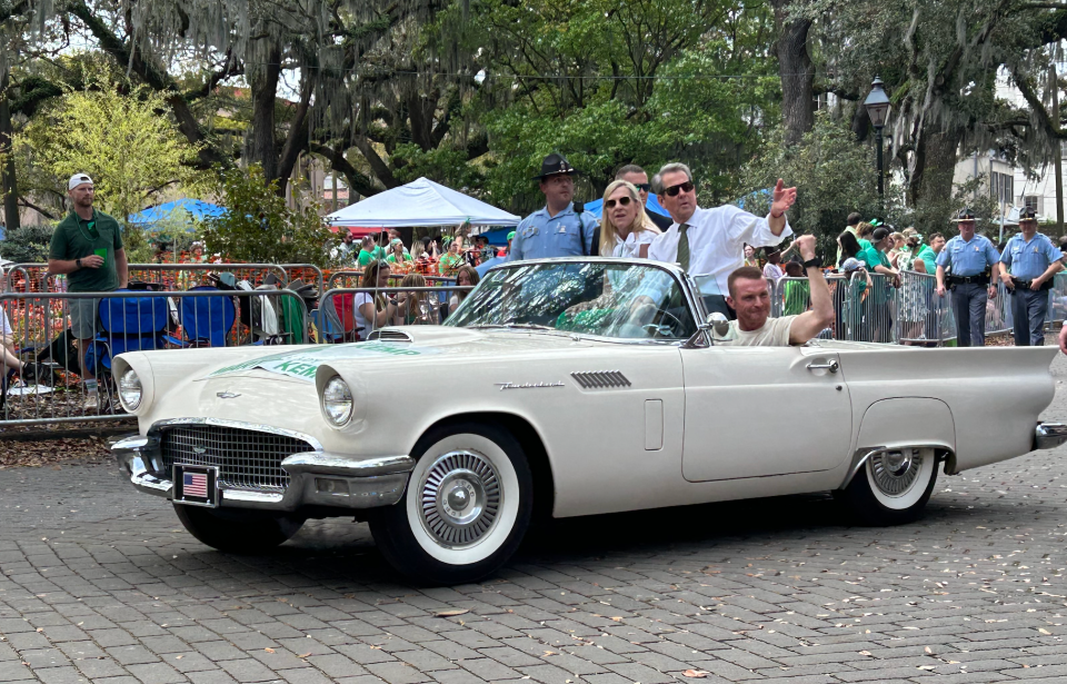 Georgia Gov. Brian Kemp and first lady Marty Kemp ride in the Savannah St. Patrick's Day parade.