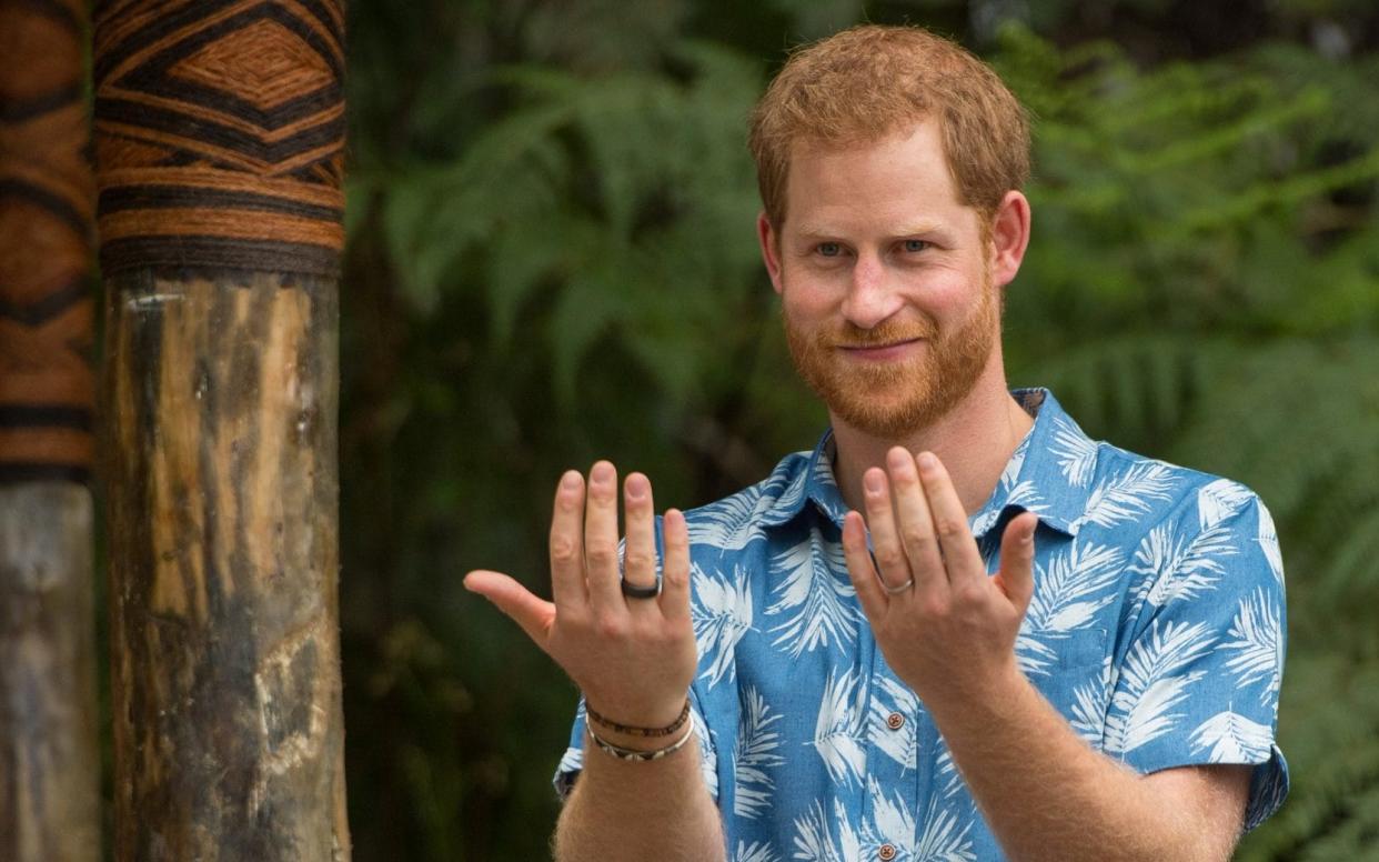 Prince Harry, pictured last month in Suva, is more popular than his grandmother and his wife, according to the YouGov survey - REUTERS