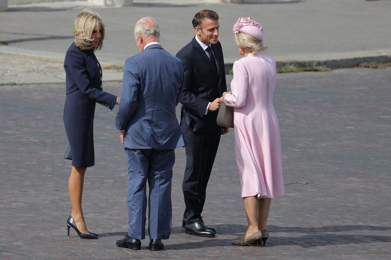 A warm welcome to the King and Queen (AFP via Getty Images)