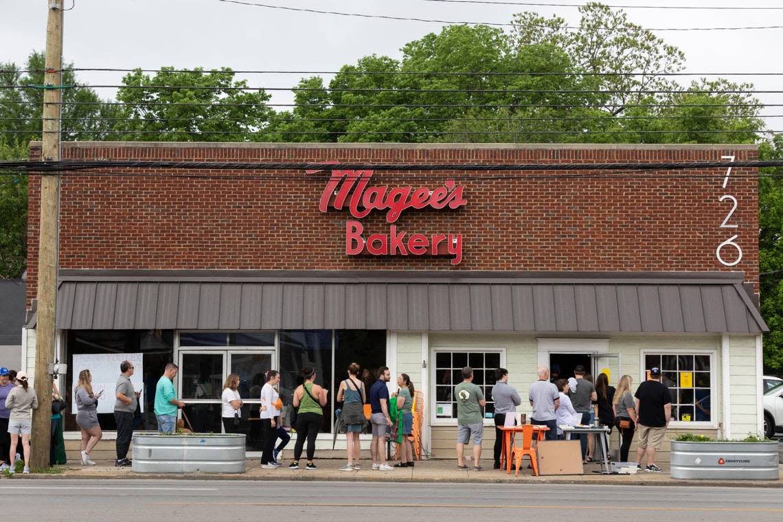 Patrons gather and line up around the corner of South Ashland Avenue and Main Street to try and purchase something on the last day of business for Magee’s Bakery in Lexington, Ky., Saturday, May 13, 2023. Some people waited in line over two hours. Silas Walker/swalker@herald-leader.com